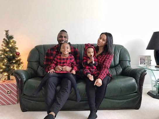 Shyle Braithwaite and Janice Braithwaite sit with their two children, in this supplied photo. 