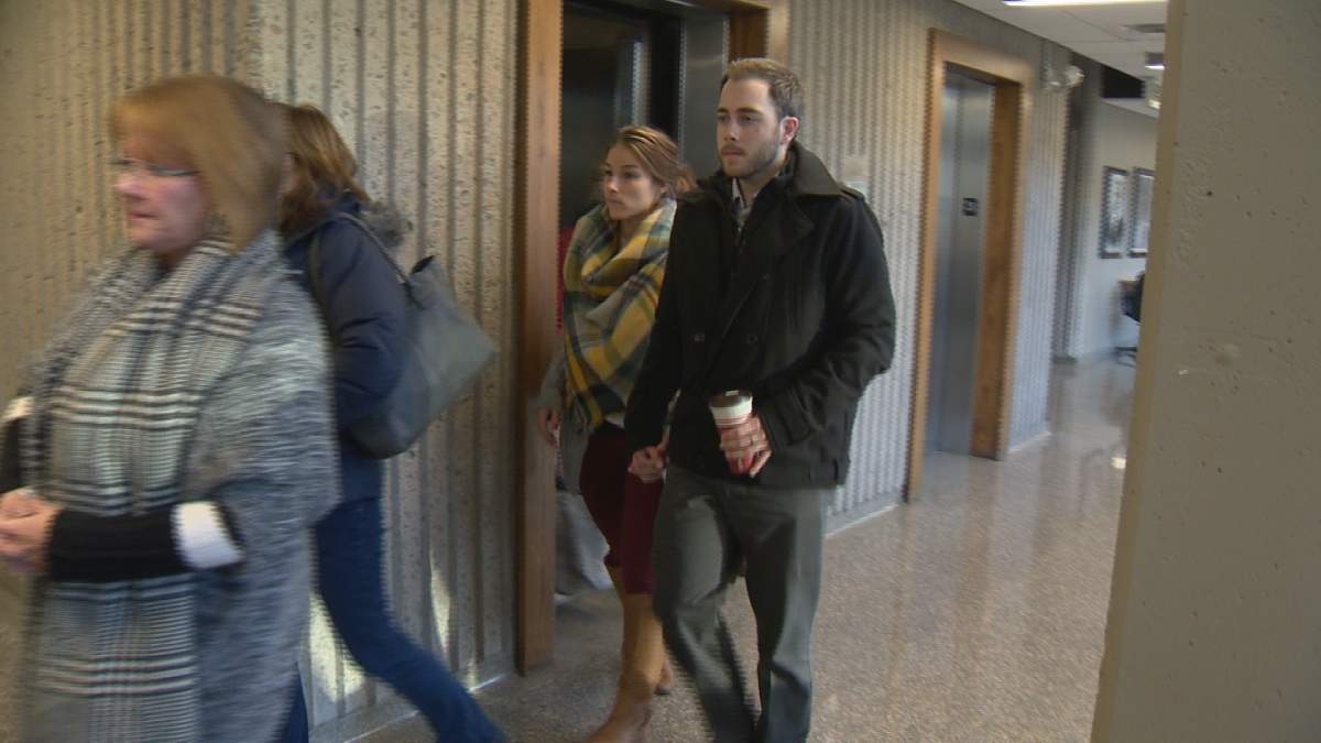 Christopher Garnier is seen walking into court hand-in-hand with his girlfriend on Thursday, Dec. 21, 2017. A few hours later, a jury convicted him of murder.