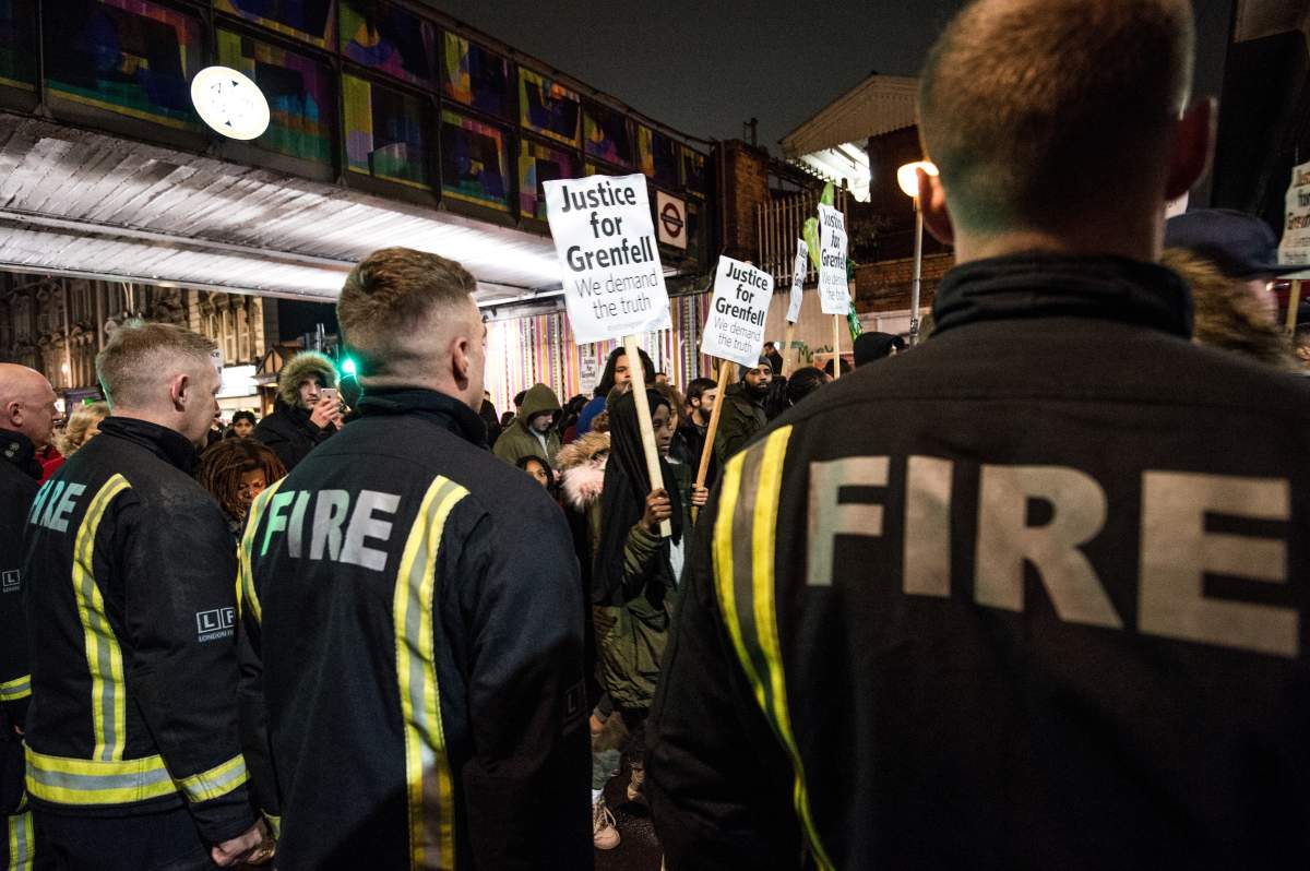 Firefighters seen participating during the monthly silent march for the Grenfell Tower fire victims. (Photo by Brais G Rouco/SOPA Images/LightRocket via Getty Images)
