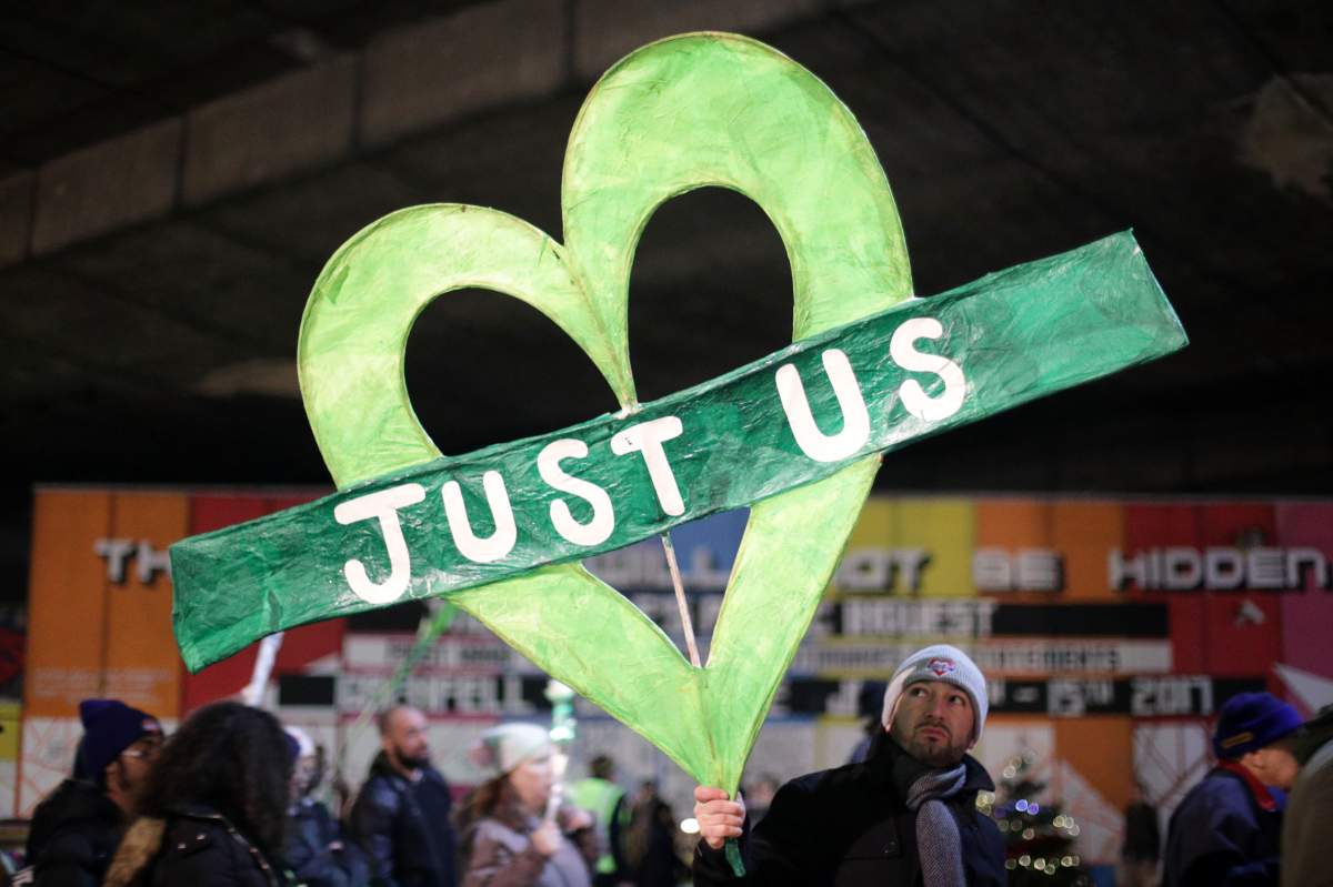 People take part in a silent walk to mark the six month anniversary of the Grenfell Tower fire, in west London. (Photo by Yui Mok/PA Images via Getty Images)