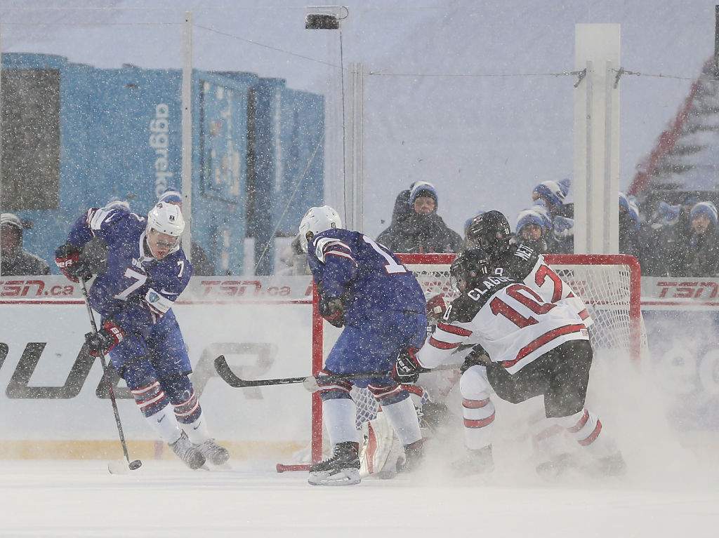 Brady Tkachuk (#7) of the U.S. team, takes a shot on the Canada net in the second period during the IIHF World Junior Championship at New Era Field on Dec. 29, 2017 in Buffalo, New York.