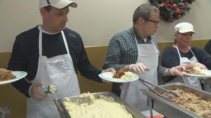 Christmas dinner with turkey, stuffing, mashed potatoes and gravy being served at the Hope Mission on Dec. 4, 2017.