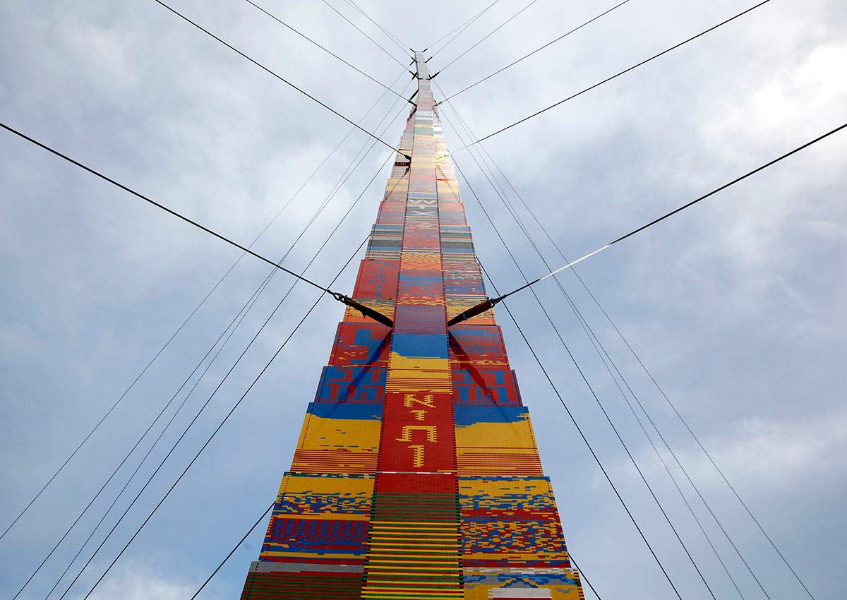 Workers build a Lego Tower at Rabin Square in Tel Aviv.