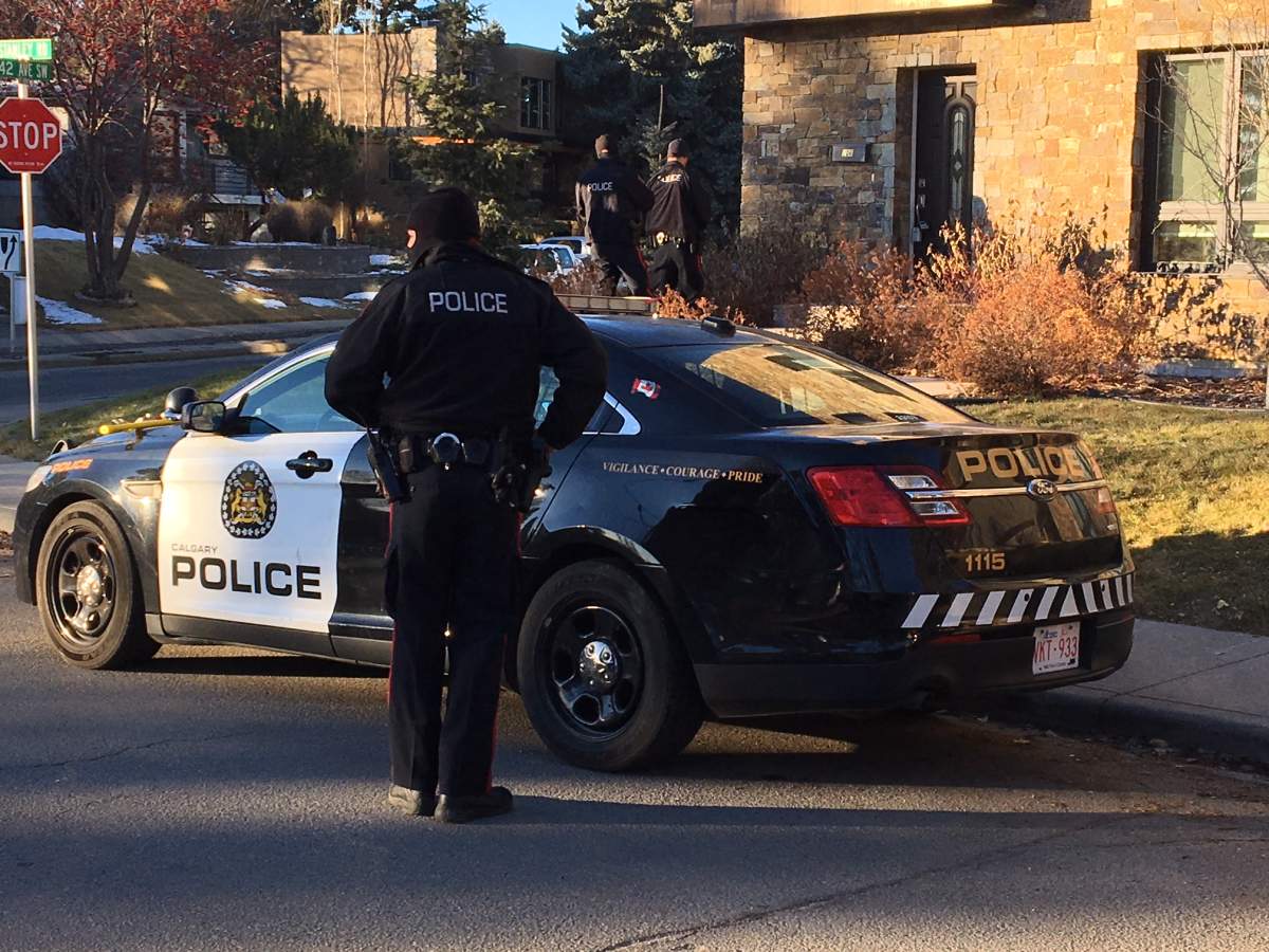 Four arrested in mid-day Calgary cellphone store robbery - image