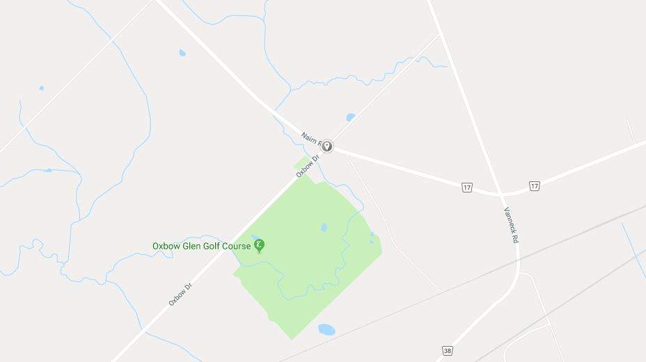 Middlesex OPP say a 25-year-old woman has been charged after a crash Thursday afternoon between a sedan and a school bus.