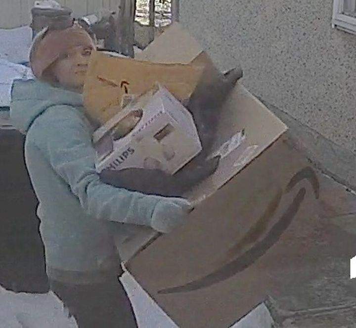 Police are looking for a woman in her mid-20s to early 30s with short hair and a thin build. 
