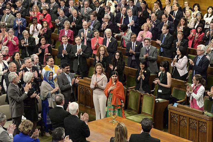Pakistani activist and Nobel Peace Prize winner Malala Yousafzai reacts as she honoured in the House of Commons on Parliament Hill in Ottawa, April 12, 2017.
