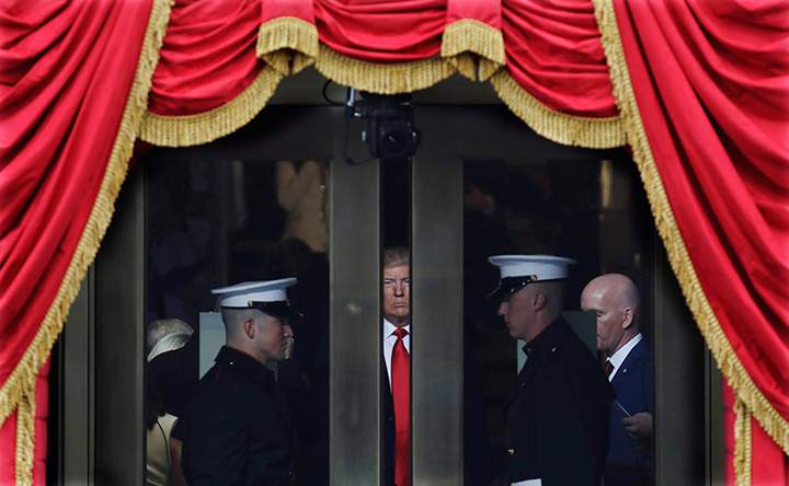 President-elect Donald Trump waits to step out onto the portico for his Presidential Inauguration at the U.S. Capitol in Washington, Jan. 20, 2017.
