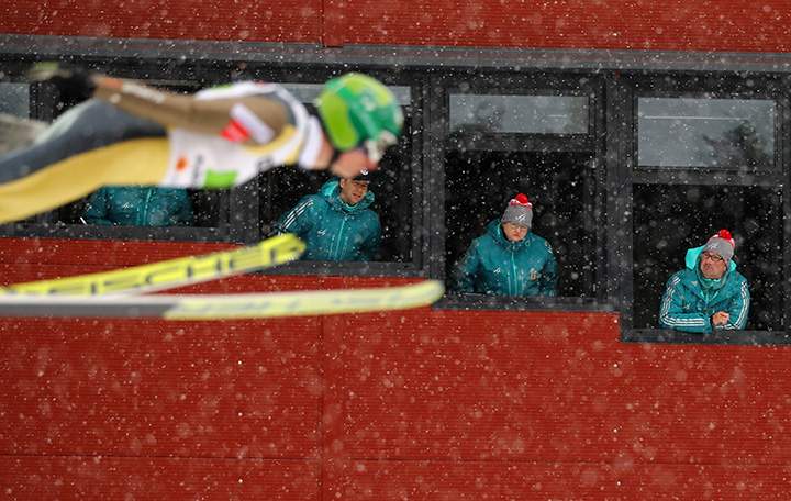 Judges watch Hannu Manninen of Finland in the men’s Nordic combined team ski jumping event during the FIS  Ski World Championships in Lahti, Finland, February, 26, 2017.