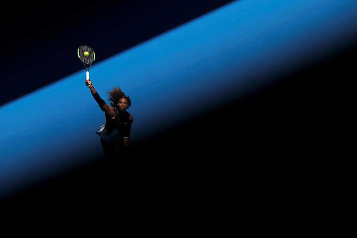 Serena Williams serves during the Australian Open at Melbourne Park, January 21, 2017.