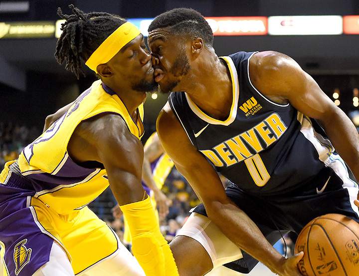 Los Angeles Lakers guard Briante Weber comes face to face with Denver Nuggets guard Emmanuel Mudiay at Citizens Business Bank Arena in Ontario, CA, October 4, 2017.