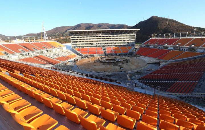 In this Monday, Oct. 30, 2017, photo, the Pyeongchang Olympic Stadium is still under construction in Pyeongchang, South Korea.