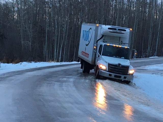 A transport truck in the ditch after losing control on an icy road in Sherwood Park. Overnight rain in the Edmonton region created treacherous conditions on area roads Friday morning.  Friday, December 15, 2017.
