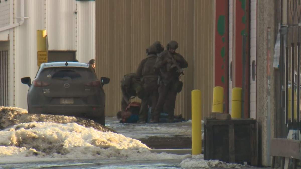 A man being taken into custody during a police incident in a Sherwood Park industrial area. December 12, 2017.