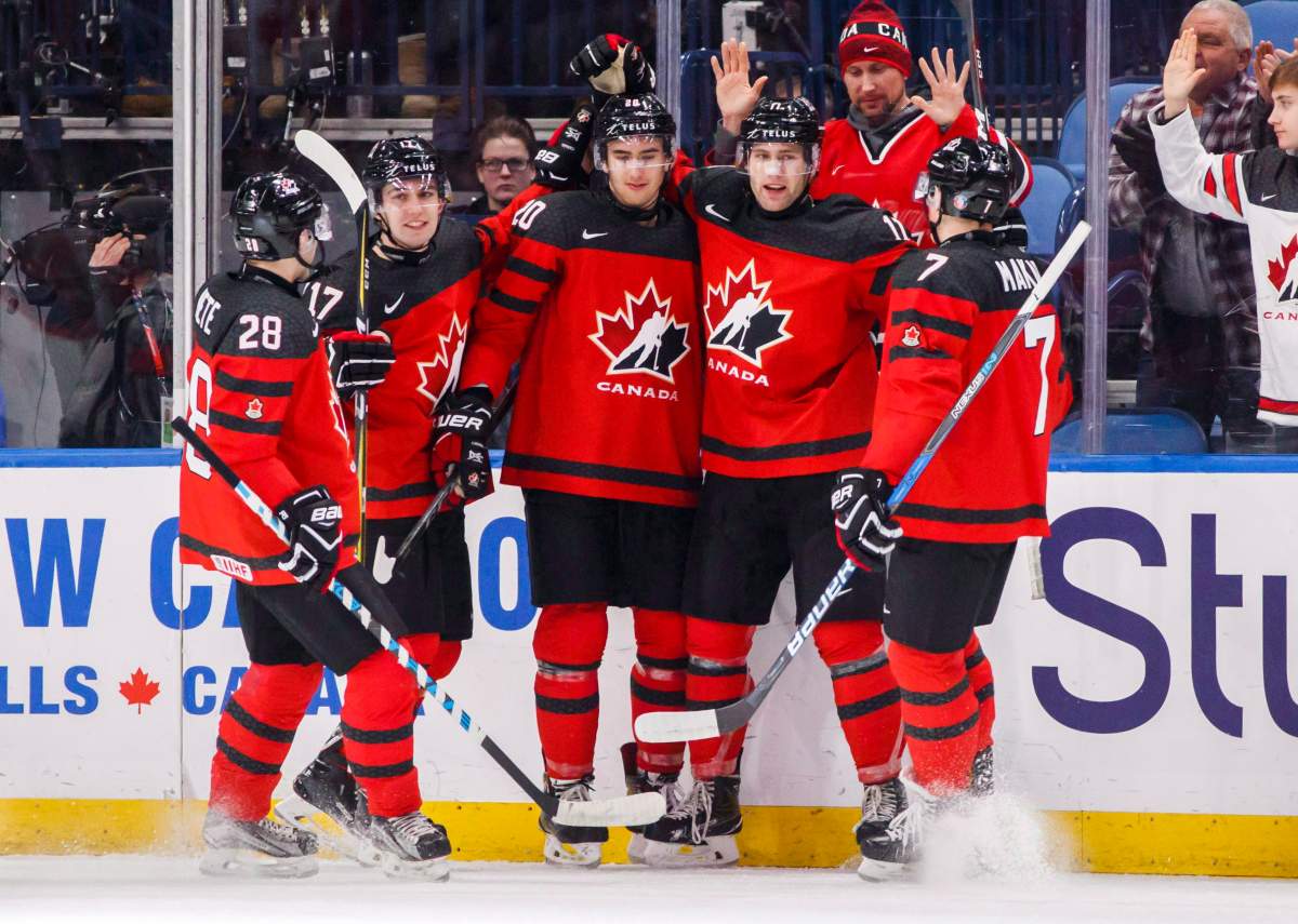 Canada’s Jonah Gadjovich, second right, celebrates his goal with teammates Michael McLeod, centre, Cale Makar, right, Tyler Steenbergen, second left, and Victor Mete against Slovakia during the second period of IIHF World Junior Championship preliminary round hockey action in Buffalo, N.Y. Wednesday December 27, 2017.