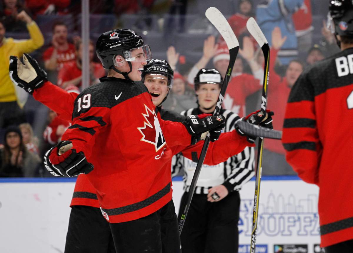 Canada forward Drake Batherson (19) celebrates his goal against the Czech Republic during the second period of a semifinal in the IIHF world junior hockey championships Thursday, Jan. 4, 2018, in Buffalo, N.Y. (AP Photo/Jeffrey T. Barnes)