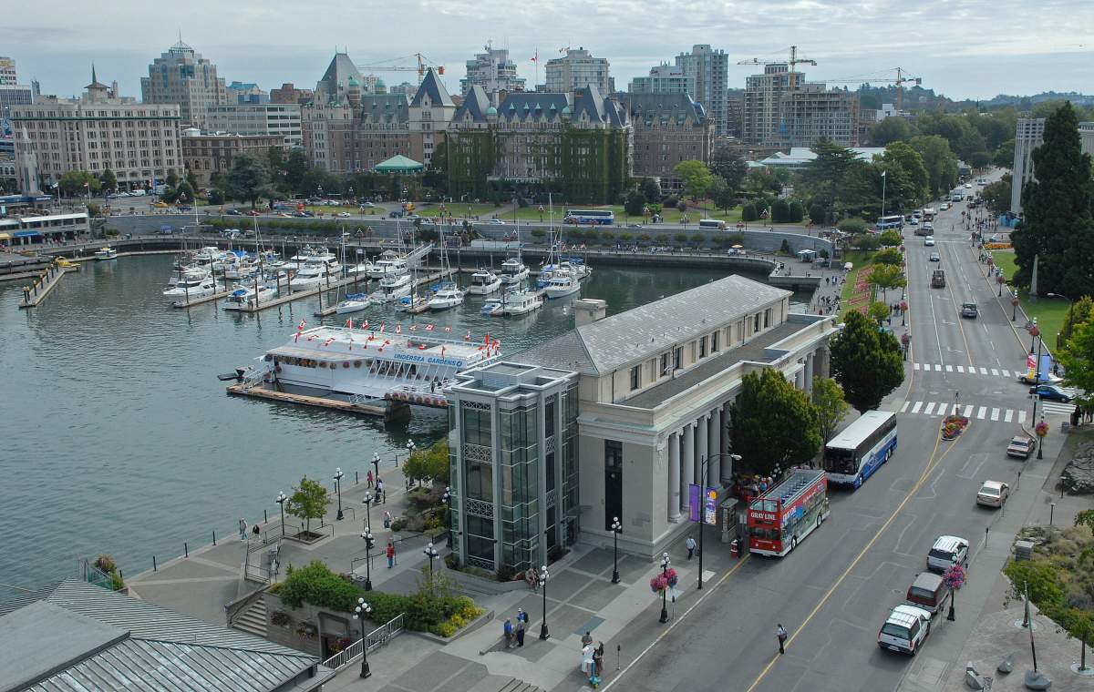 A view of the skyline along the Inner Harbour and traffic in downtown Victoria, British Columbia, Canada. 