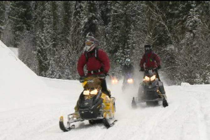 Three lost snowmobilers are fine after being rescued from a Revelstoke area mountain. 
