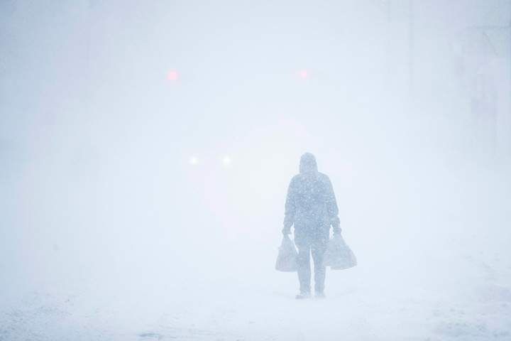 A man makes his way through the snowfall in Atlantic City, N.J., Jan. 4, 2018.