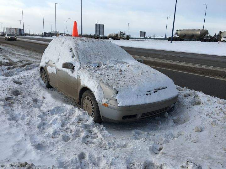 A car abandoned along Gateway Blvd in south Edmonton.