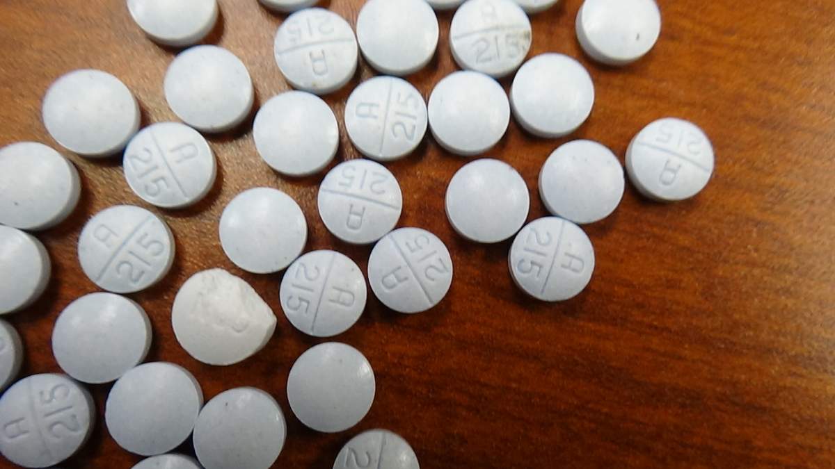 Police allege a Peterborough man arrested on a warrant was also found to be in possession of fentanyl.