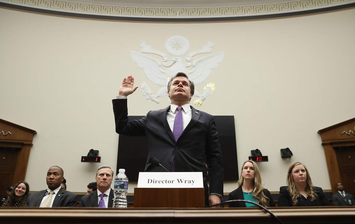 FBI Director Christopher Wray is sworn in prior to testifying before the House Judiciary Committee December 7, 2017 in Washington, DC. The committee hearing focused on oversight of the Federal Bureau of Investigation. 