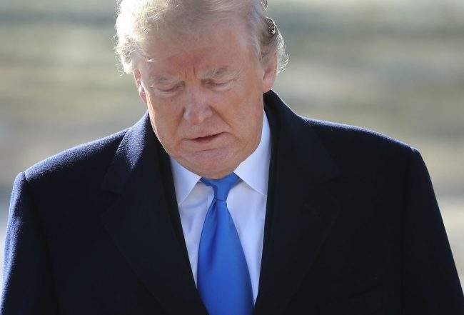 U.S. President Donald Trump walks from the Oval Office to speak with members of the press while departing the White House January 5, 2018 in Washington, DC. Trump is scheduled to spend the weekend at the presidential retreat, Camp David.
