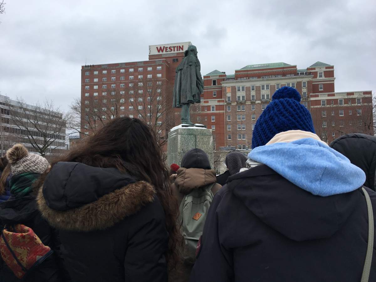 El Jones (left) and Rebecca Thomas look on at the second women’s march in Halifax.