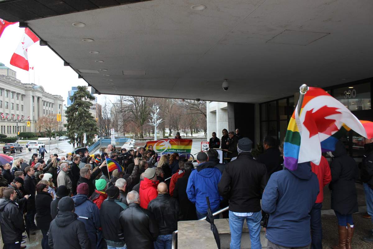 The freezing rain didn't stop a large crowd from gathering in front of city hall to hear Mayor Matt Brown's apology.
