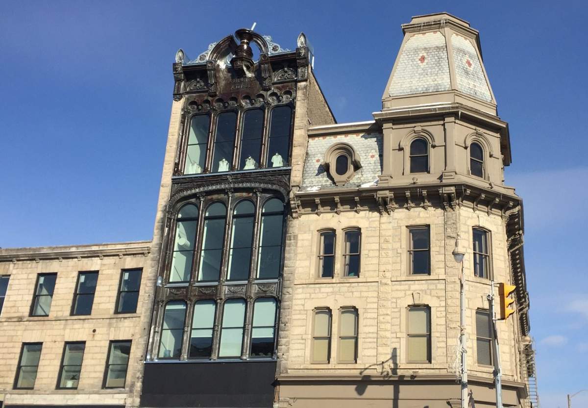 After an extensive restoration project, the facade of Guelph's Petrie Building was revealed this week.