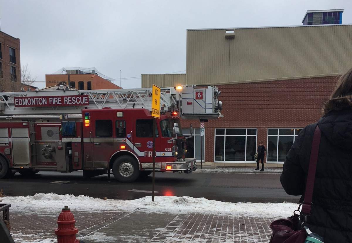 Fire crews are seen outside the Varscona Theatre in Old Strathcona after smoke was reported on Jan. 25, 2017.