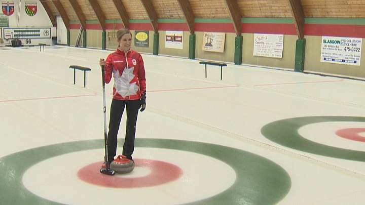 Winnipeg's Kaitlyn Lawes poses for pictures in her new Canadian Olympic uniform.