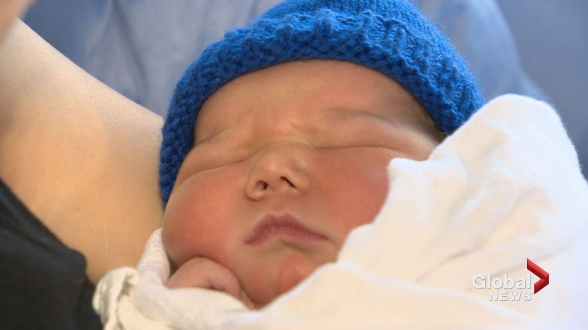 Remington James Muir was born at 12:00:12 a.m. on New Year's Day 2018. 