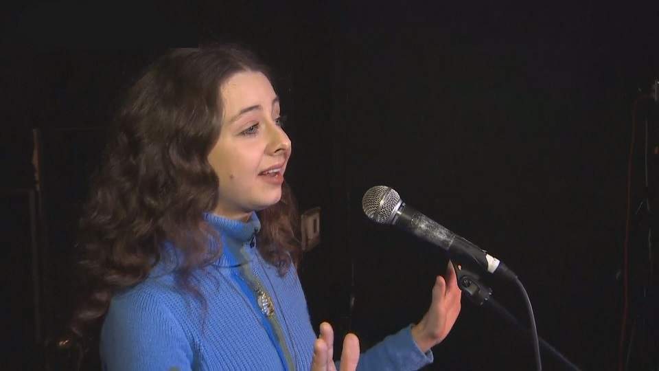 Poet Larysa Musick performs her work in "slam poetry" form. 