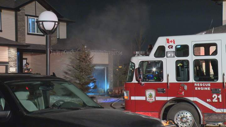People sleeping in a Saskatoon home were alerted to a fire in their garage by smoke detectors.