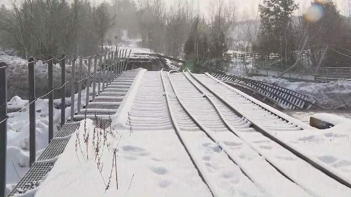 Part of a railway bridge in Sherbrooke, Que. was washed away due to rising water levels. Saturday, Jan. 13, 2018.