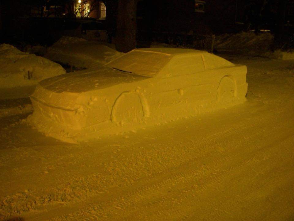 A “snow car” sculpture parked on Montreal street after 35 cm snowfall. Jan. 14, 2018. Photo Credit: Simon Laprise