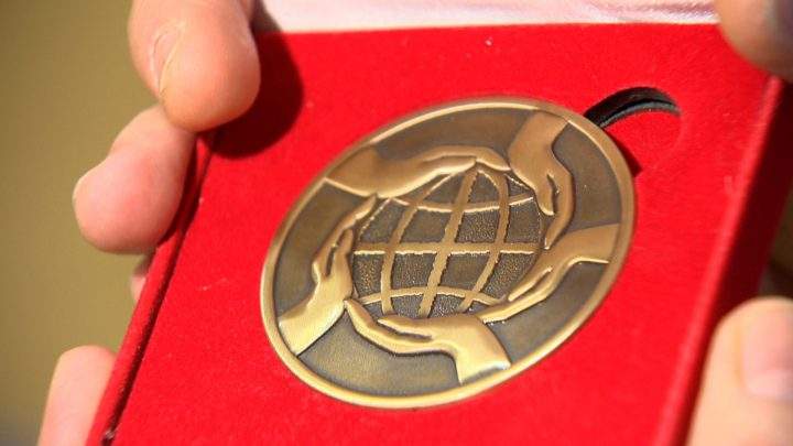 The YMCA recognized École St. Matthew School with a peace medal.
