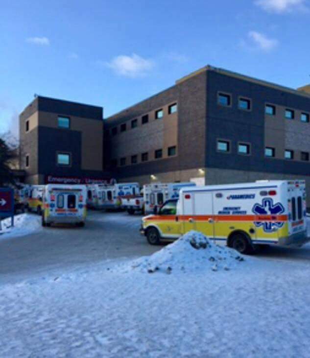 Health officials downplay row of ambulances outside Winnipeg hospital - image