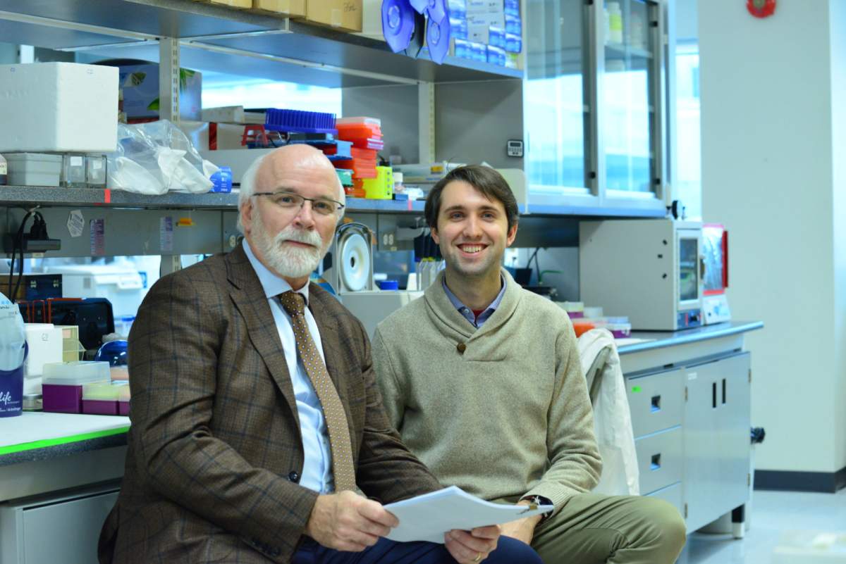 Dr. Michael Strong and Alex Moszczynski, PhD, in the lab at Robarts Research Institute at Western University.