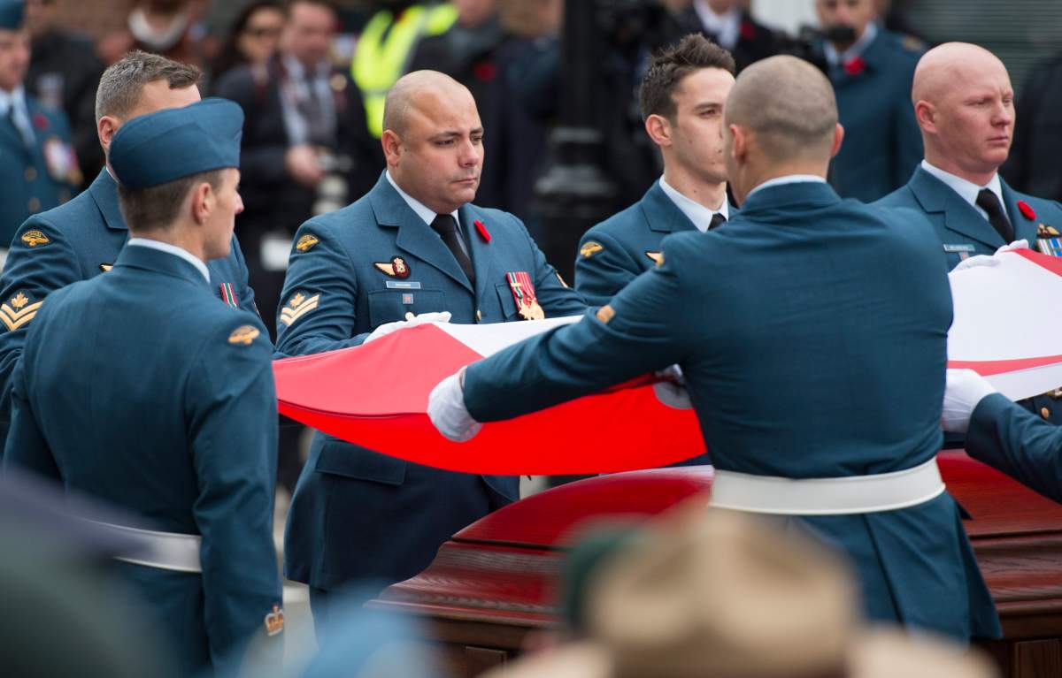 The funeral of Warrant Officer Patrice Vincent, killed in an October 2014 terrorist attack in Quebec. On social media, Othman Hamdan allegedly called Vincent's killer a "hero." THE CANADIAN PRESS IMAGES/Graham Hughes.