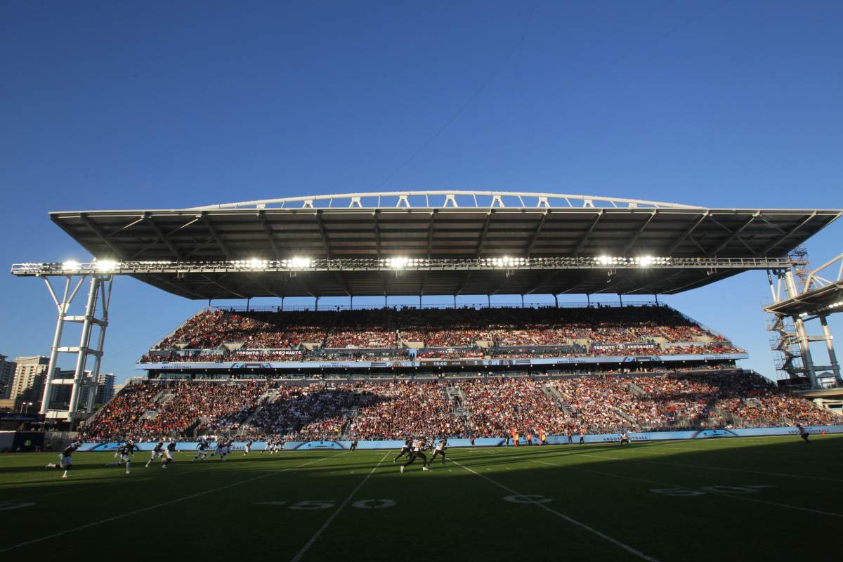 Argos fans celebrate their new home at BMO Field during the kickoff for CFL action against the Ti-Cats in Toronto on Thursday, June 23, 2016.