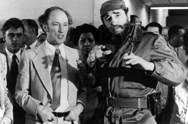 Prime Minister Pierre Trudeau looks on as Cuban President Fidel Castro gestures during a visit in Havana on Jan. 27, 1976.