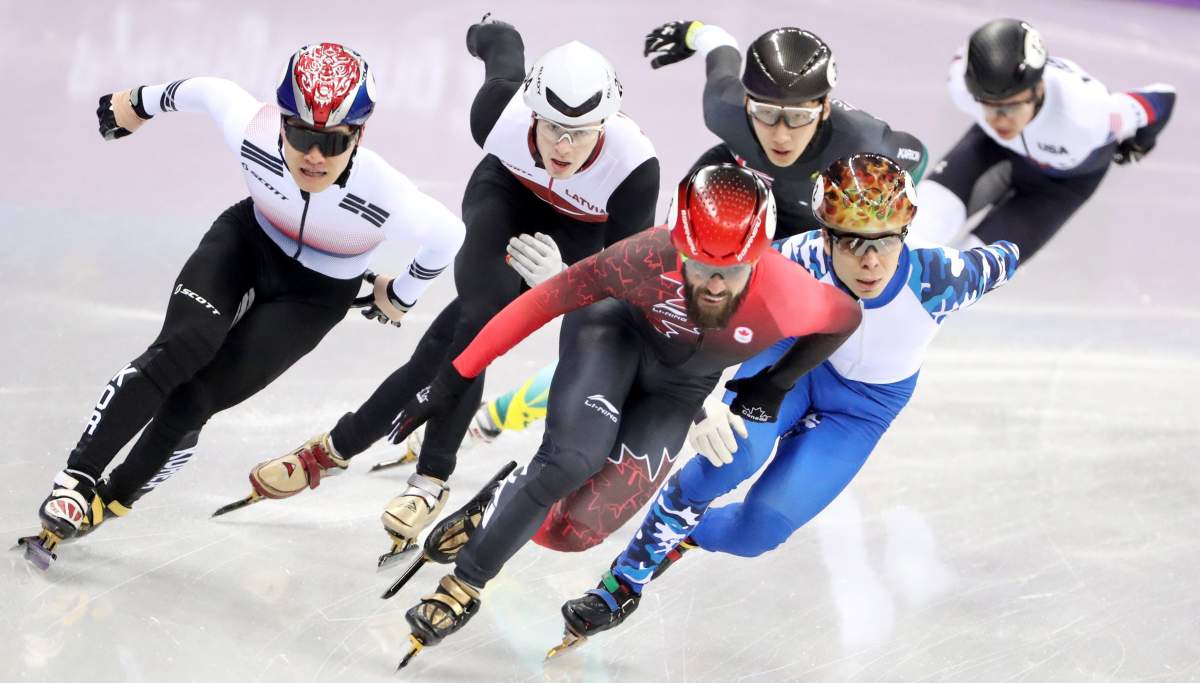 Charles Hamelin of Canada (C) and Semen Elistratov (R, front) of the Olympic Athlete from Russia (OAR) in action during the Men’s Short Track Speed Skating 1500 m competition at the Gangneung Ice Arena during the PyeongChang 2018 Olympic Games, South Korea, 10 February 2018.