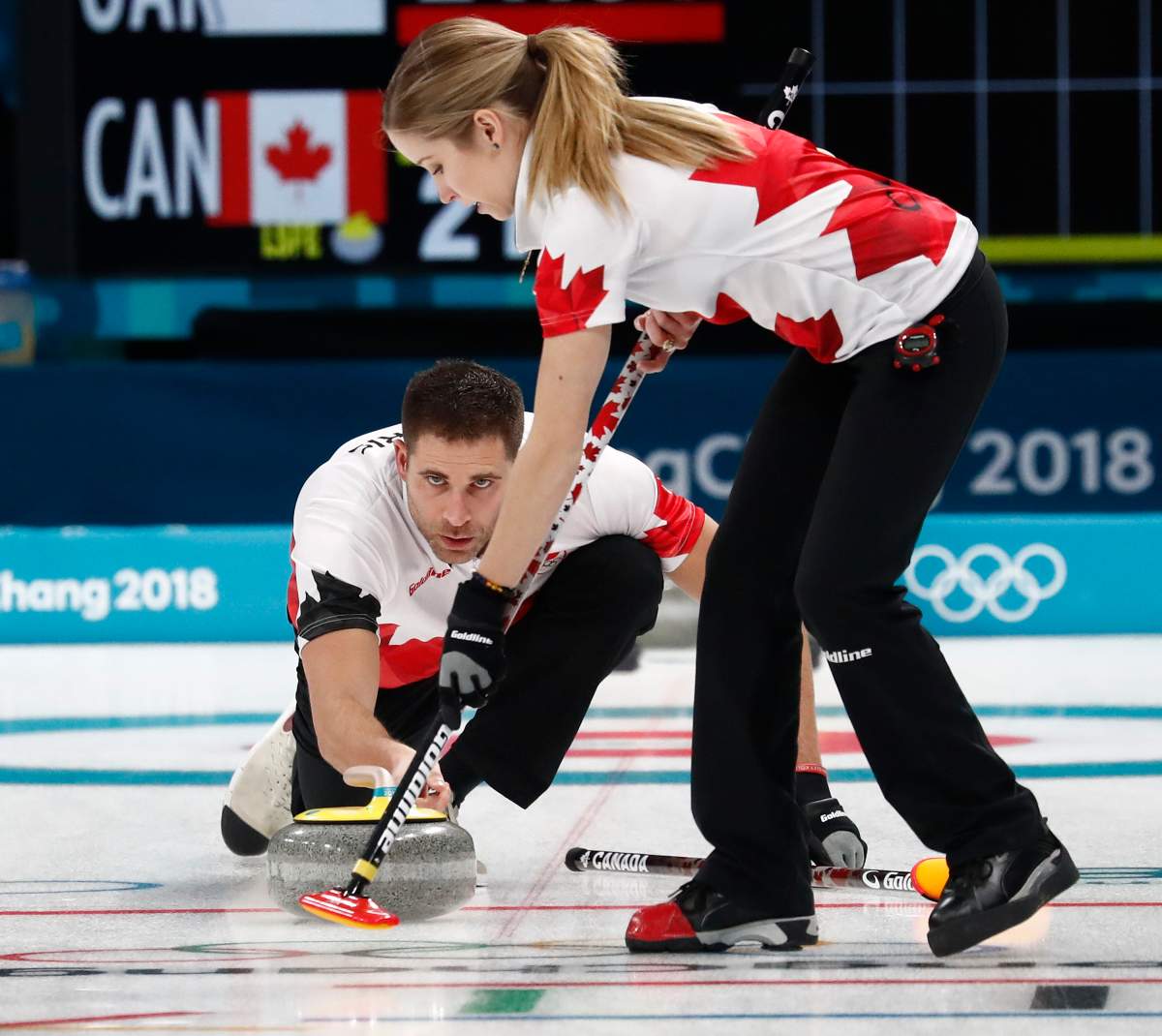 Kaitlyn Lawes (R) and John Morris (L) of Canada compete against Olympic Athlete from Russia during the Mixed Doubles Round Robin Session 6 inside the Gangneung Curling Centre at the PyeongChang Winter Olympic Games 2018, in Gangneung, South Korea, 10 February 2018. EPA/LARRY W. SMITH