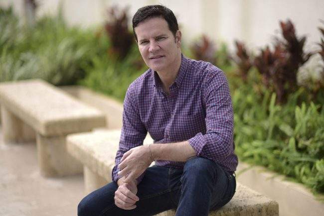 In this Feb. 11, 2018 photo, Juan Carlos Cruz, victim of Chilean pedophile priest Fernando Karadima, poses for a portrait in San Juan, Puerto Rico. 