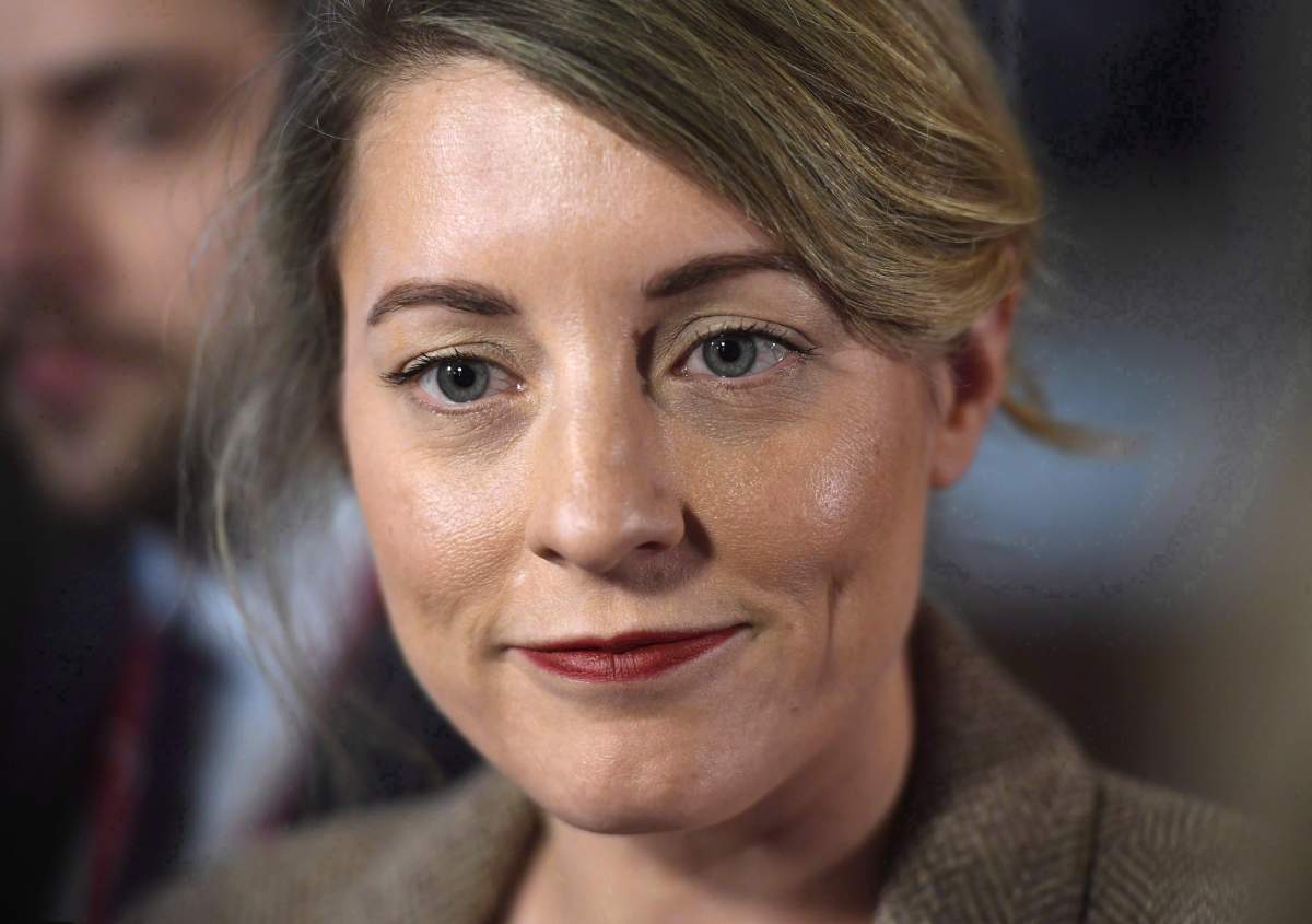 Minister of Canadian Heritage Melanie Joly speaks to reporters after leaving a cabinet meeting on Parliament Hill in Ottawa on February 6, 2018. 