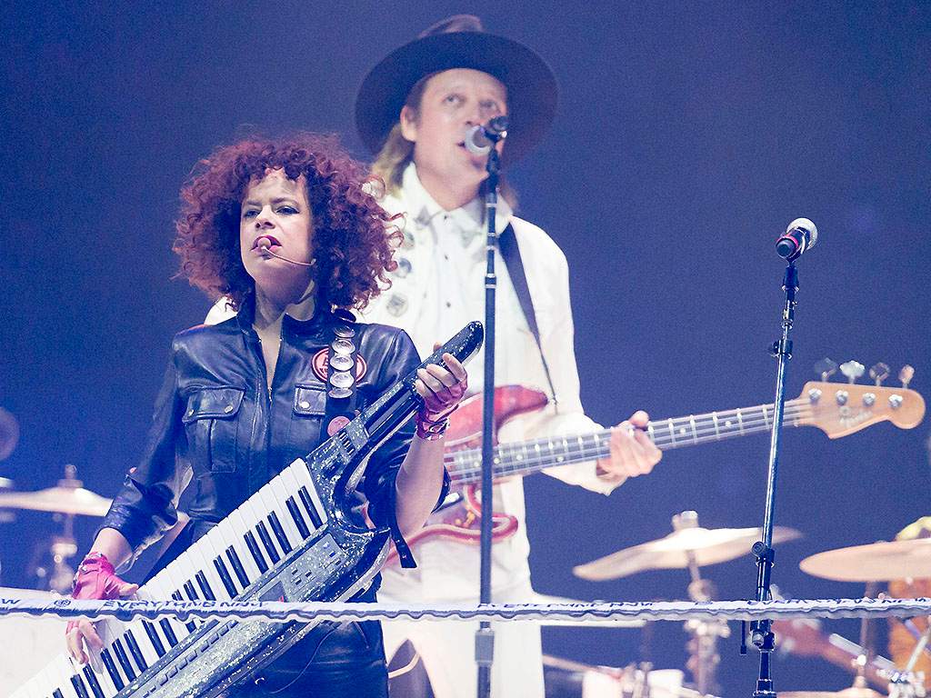 Régine Chassagne and Win Butler of Arcade Fire perform at the Air Canada Centre on November 3, 2017.