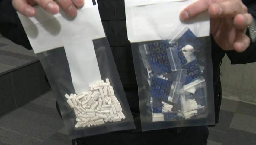 Sgt. Jag Khosa of the CFSEU-BC holds up baggies in an interview with Global News.