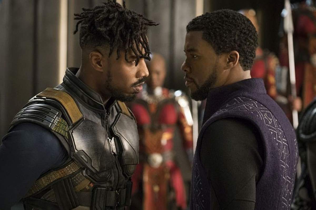 Michael B. Jordan (L) and Chadwick Boseman (R) star in ‘Black Panther.’